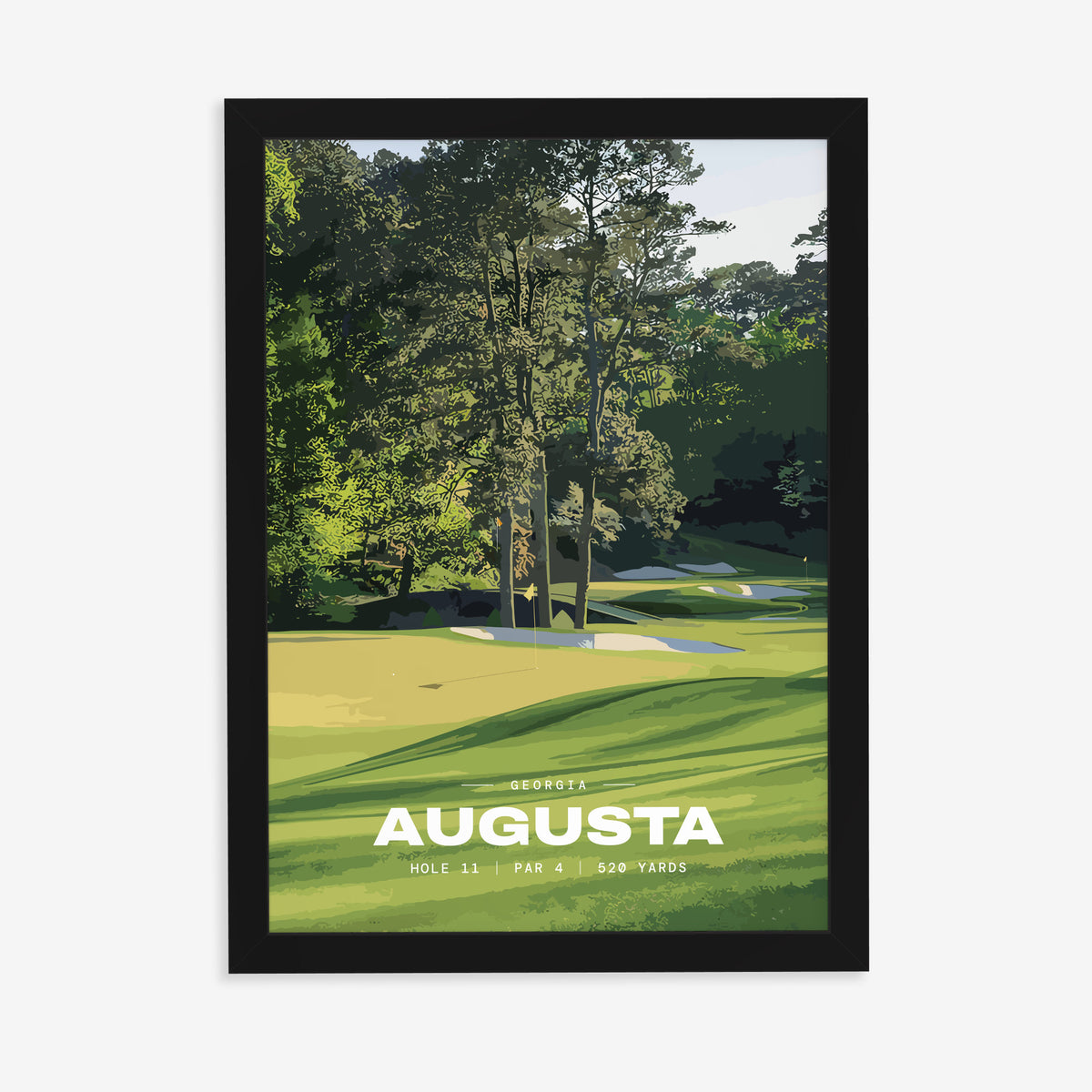 Augusta 11th hole golf print of a green below tall Georgia pines, in a black frame on a plain wall