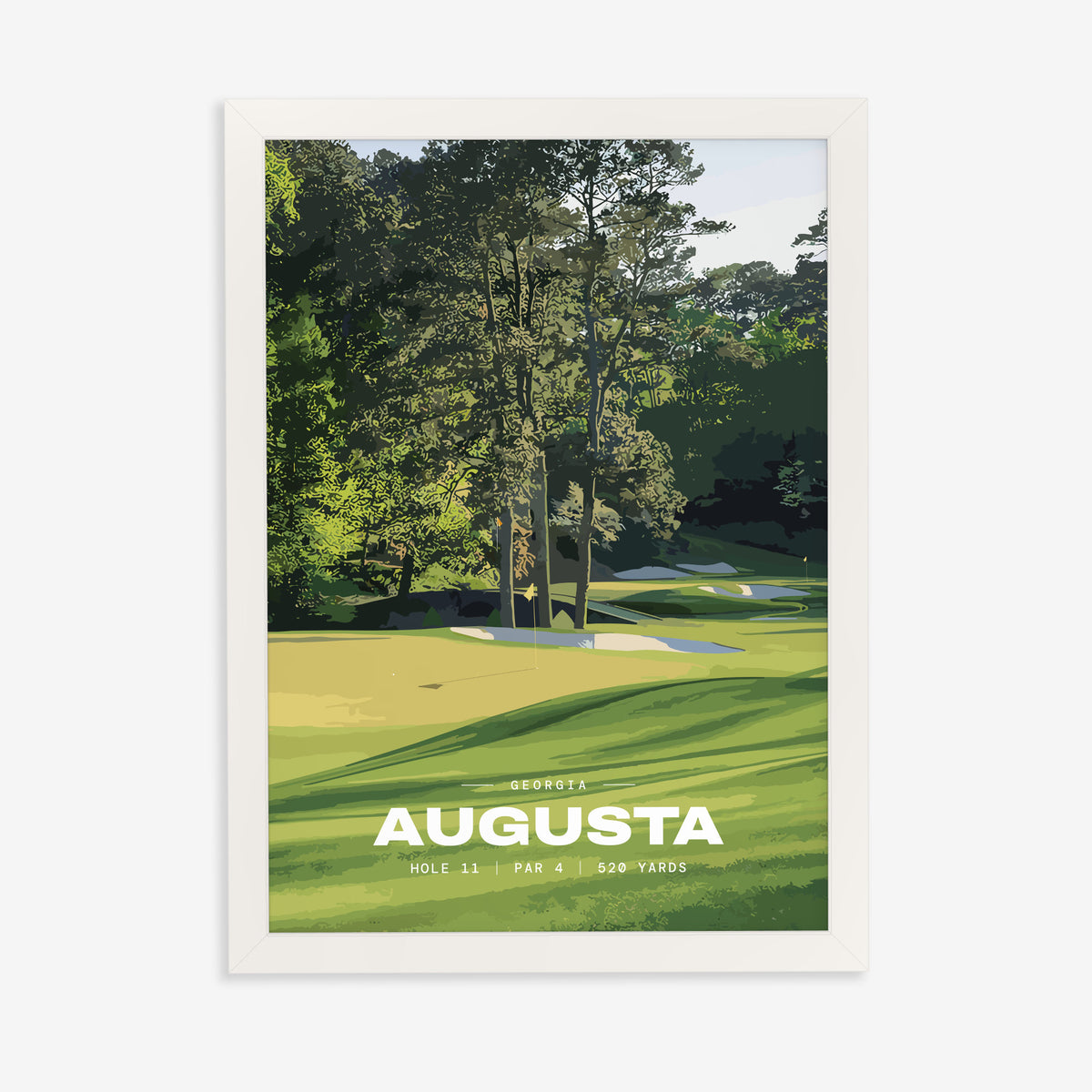 Augusta 11th hole golf print of a green below tall Georgia pines, in a white frame on a plain wall