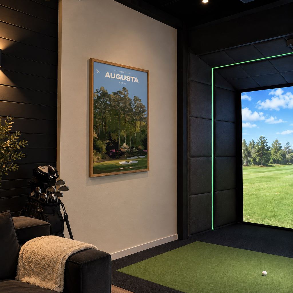 Augusta 12th hole golf print of a par 3 green below azaleas and pines, framed in a golf simulator room