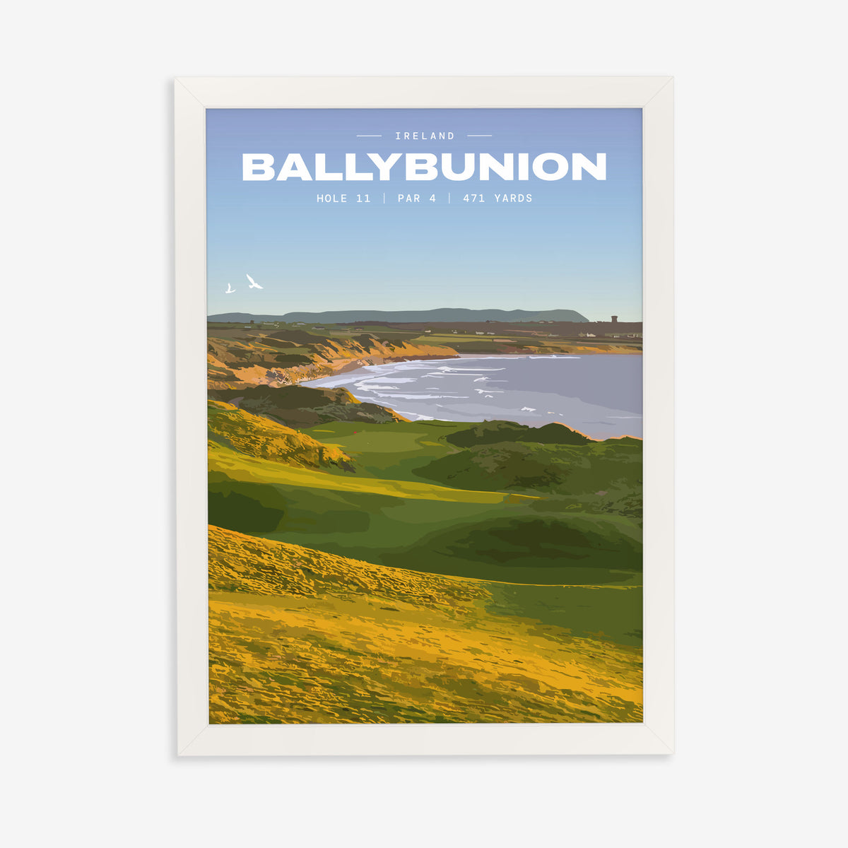 Ballybunion 11th hole golf print of dunes running down to an Atlantic bay, in a white frame on a plain wall