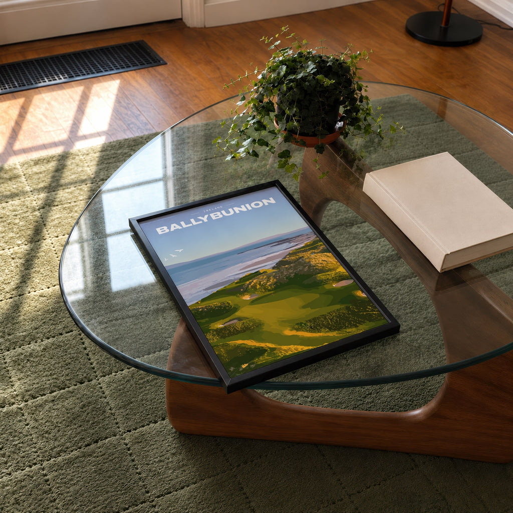 Ballybunion golf print of links greens in the dunes above the sea, framed on a glass coffee table