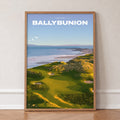Ballybunion golf print of links greens in the dunes above the sea, in an oak frame, leaning against a wall on a herringbone floor