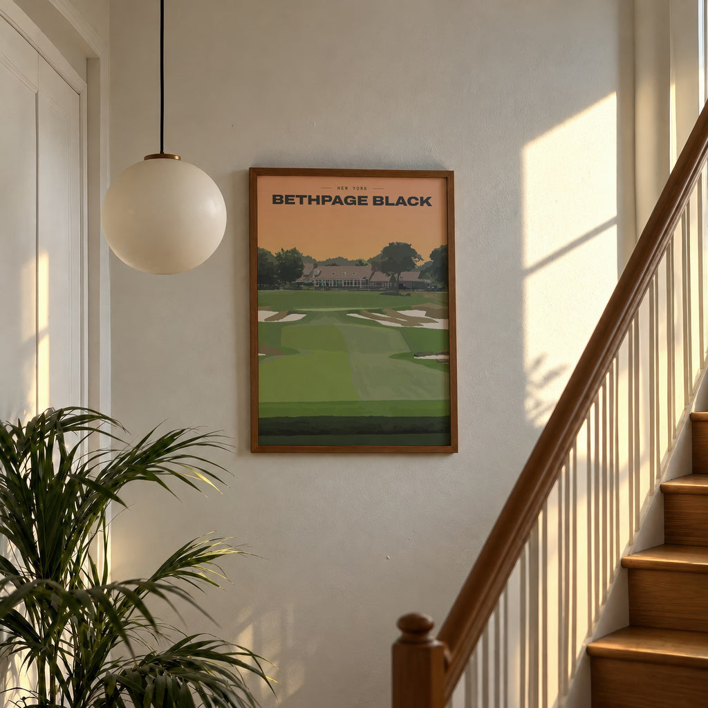 Bethpage Black golf print of a bunkered fairway up to the clubhouse, framed above a sunlit staircase