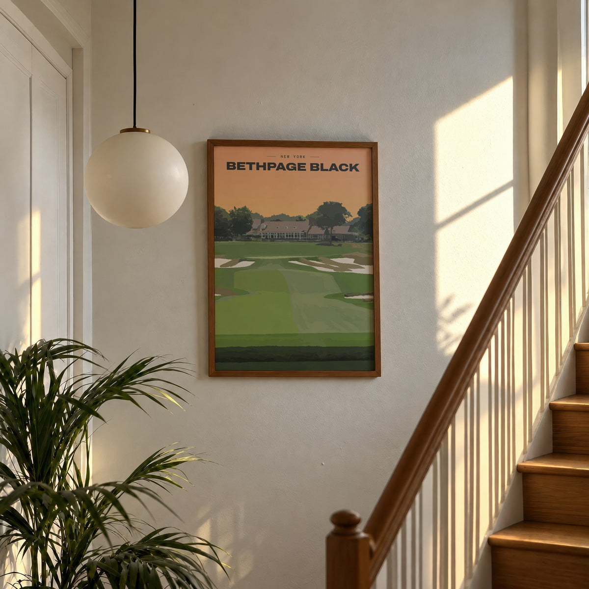 Bethpage Black golf print of a bunkered fairway up to the clubhouse, framed above a sunlit staircase