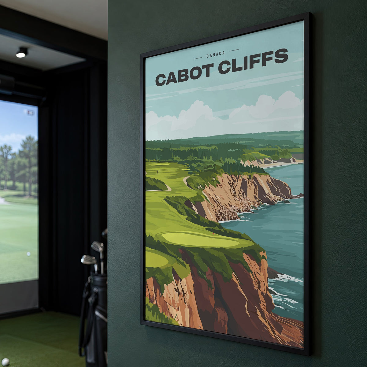 Cabot Cliffs golf print of a green on red clifftops above the sea, framed on a green wall beside a golf simulator