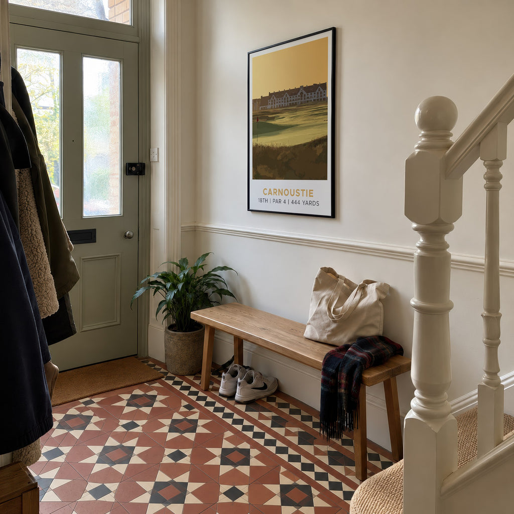 Carnoustie 18th hole golf print of the 18th green in golden light, framed in a hallway with patterned floor tiles