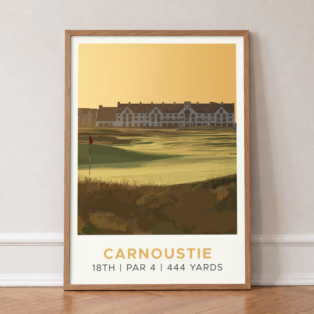 Carnoustie 18th hole golf print of the 18th green in golden light, in an oak frame, leaning against a wall on a herringbone floor