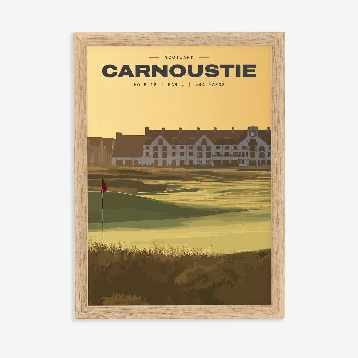 Carnoustie 18th hole golf print of the 18th green at dusk, the hotel behind, in a natural wood frame on a plain wall