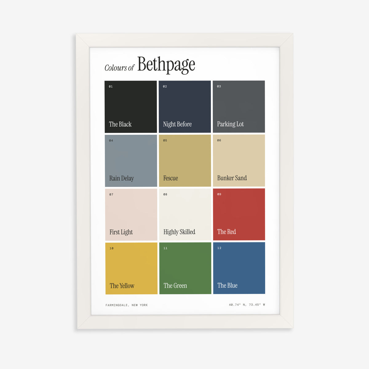 Colours of Bethpage print of twelve named colour squares on white, in a white frame on a plain wall