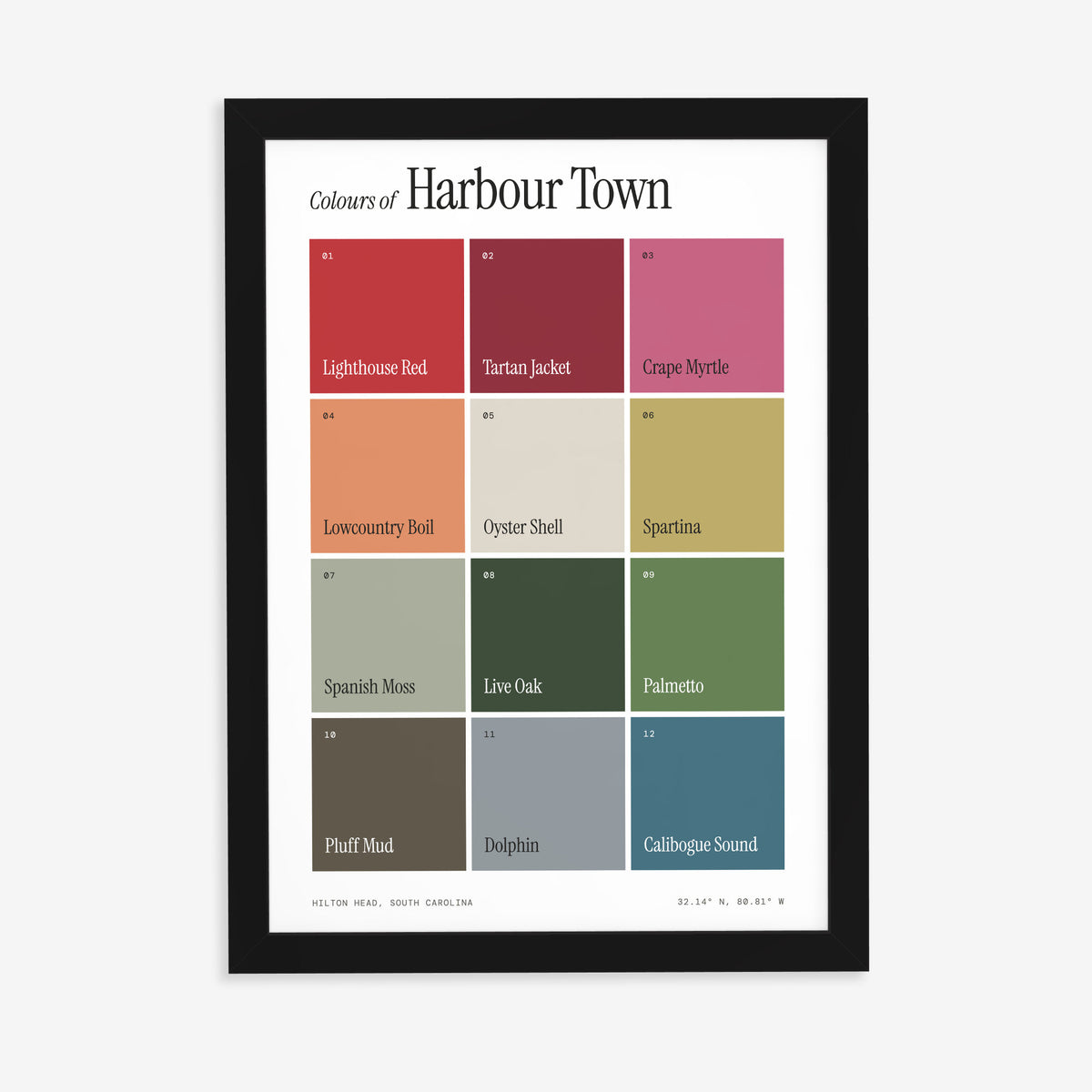 Colours of Harbour Town print of twelve named colour squares on white, in a black frame on a plain wall