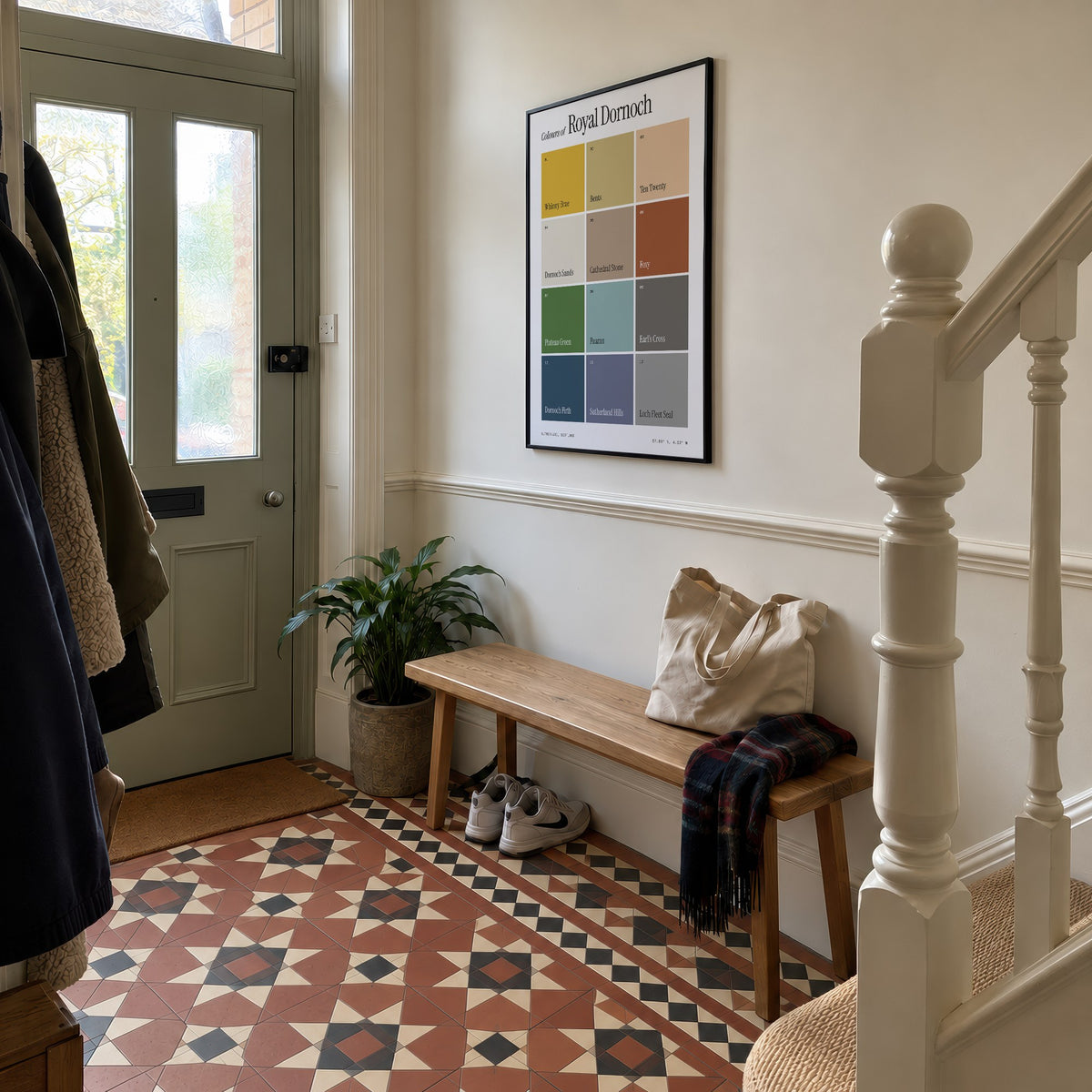 Colours of Royal Dornoch print of twelve named colour squares on white, framed in a hallway with patterned floor tiles
