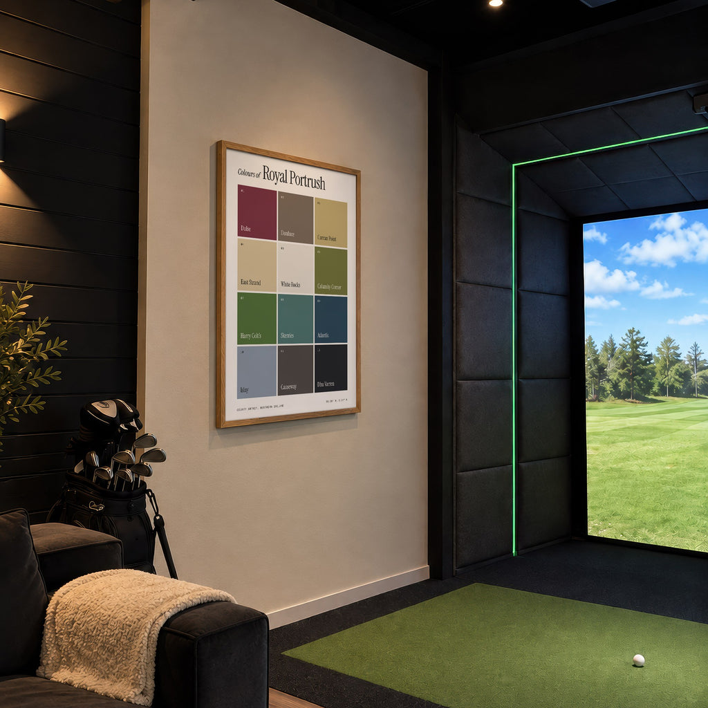 Colours of Royal Portrush print of twelve named colour squares on white, framed in a golf simulator room