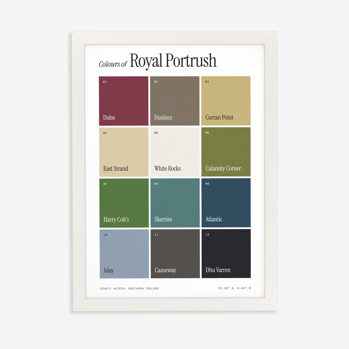 Colours of Royal Portrush print of twelve named colour squares on white, in a white frame on a plain wall