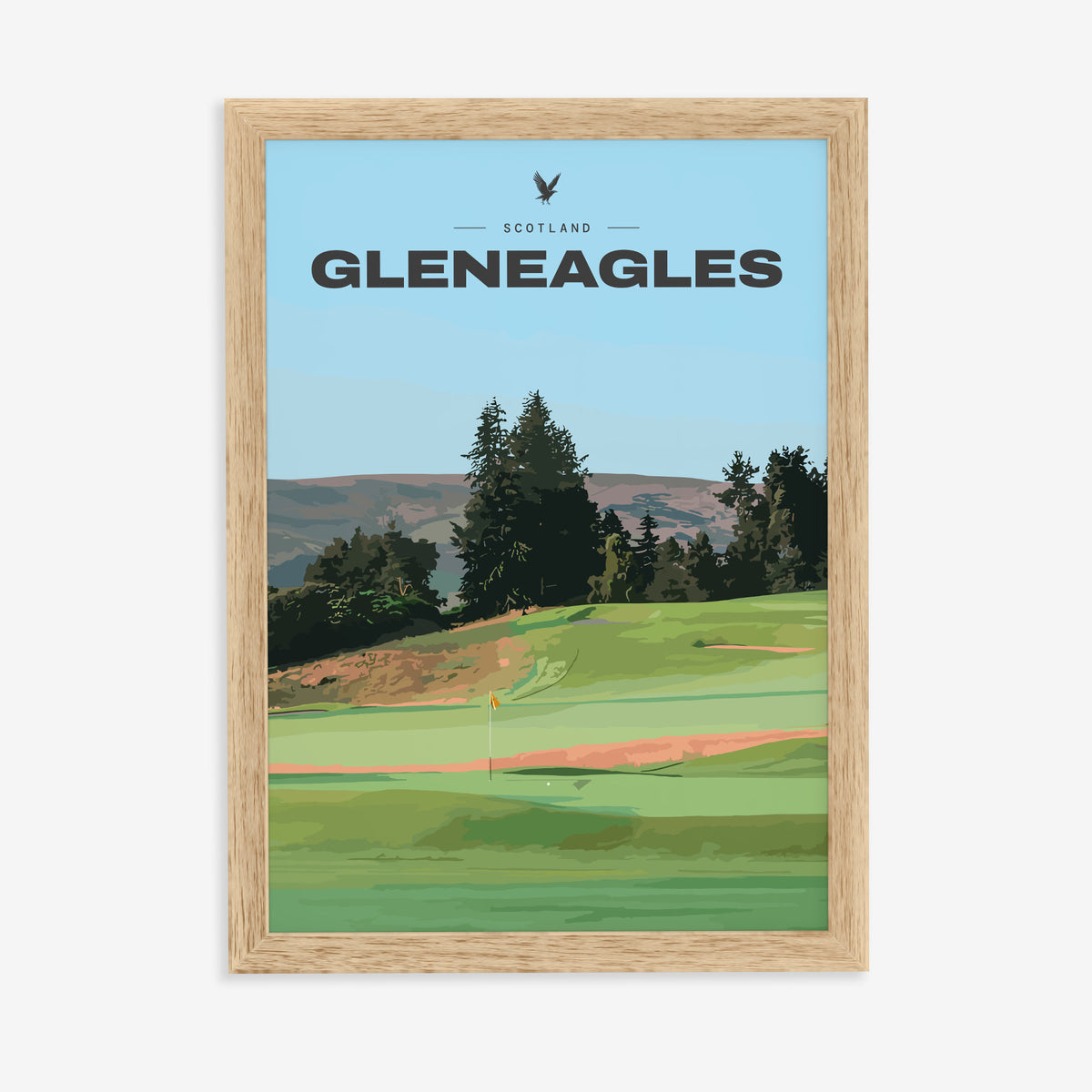 Gleneagles golf print of a green below pines and Perthshire hills, in a natural wood frame on a plain wall
