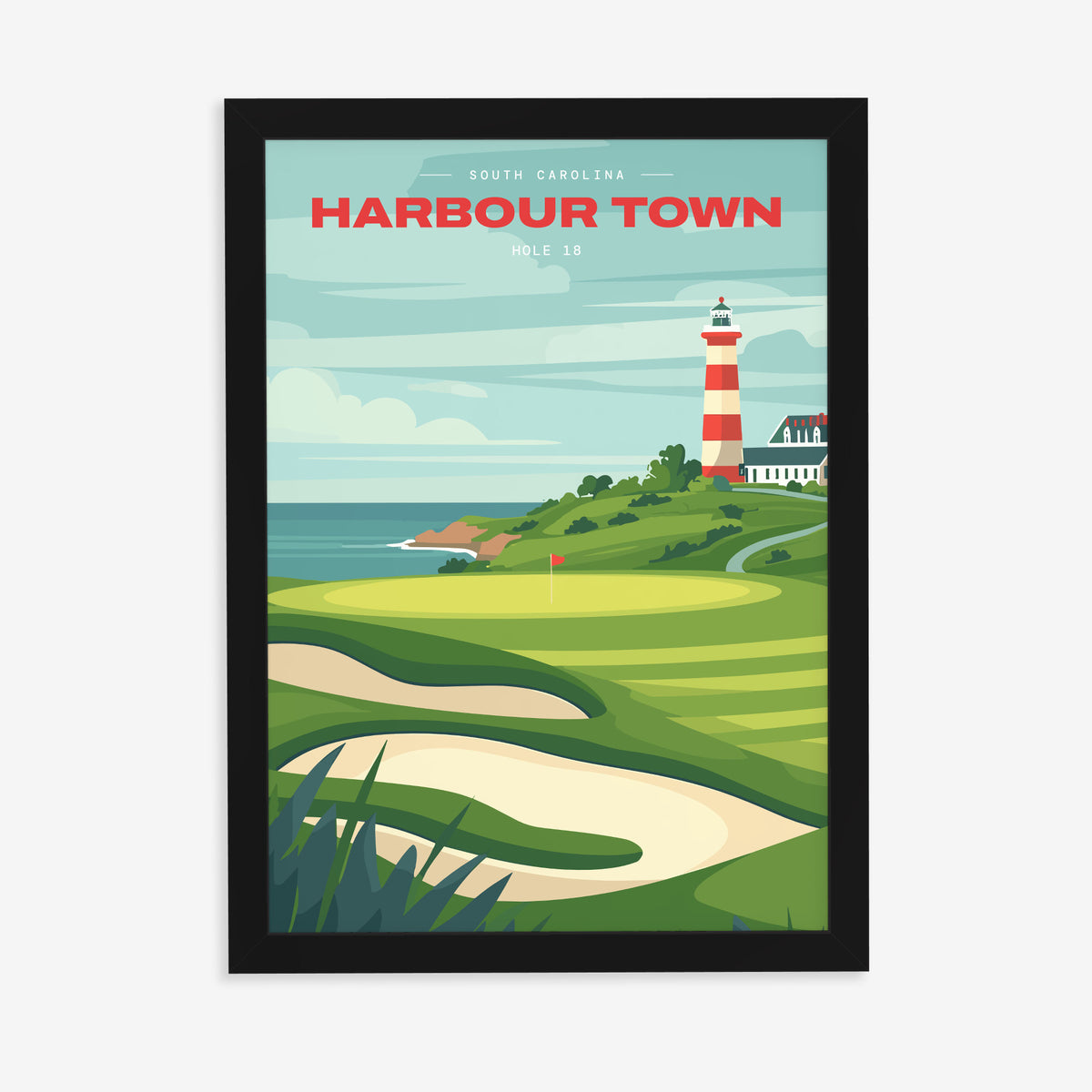 Harbour Town 18th hole golf print of a green below a striped lighthouse, in a black frame on a plain wall