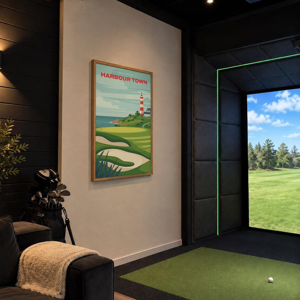 Harbour Town 18th hole golf print of a green below a striped lighthouse, framed in a golf simulator room