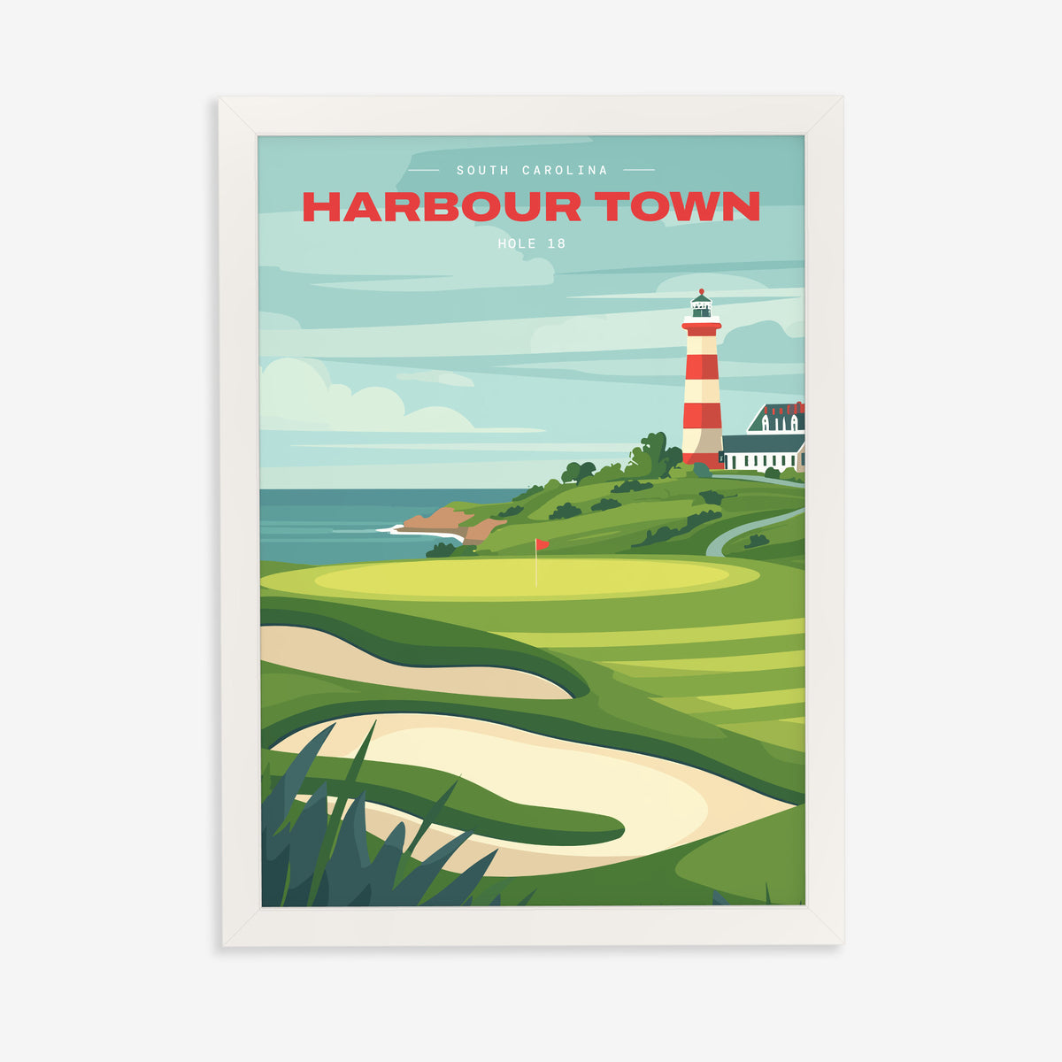 Harbour Town 18th hole golf print of a green below a striped lighthouse, in a white frame on a plain wall