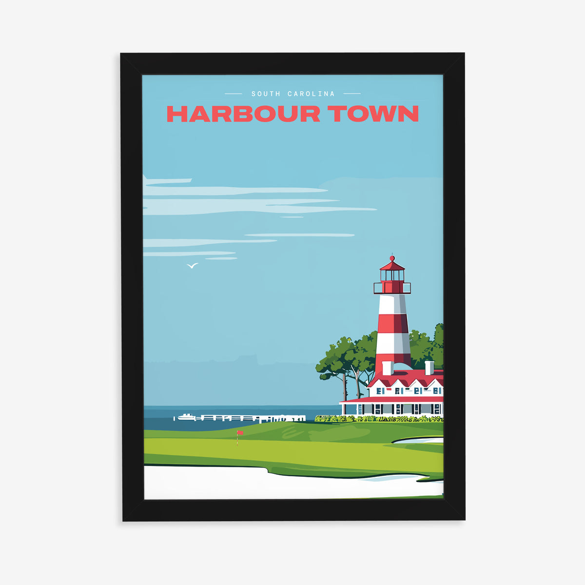Harbour Town Lighthouse golf print of a striped lighthouse above a marina, in a black frame on a plain wall