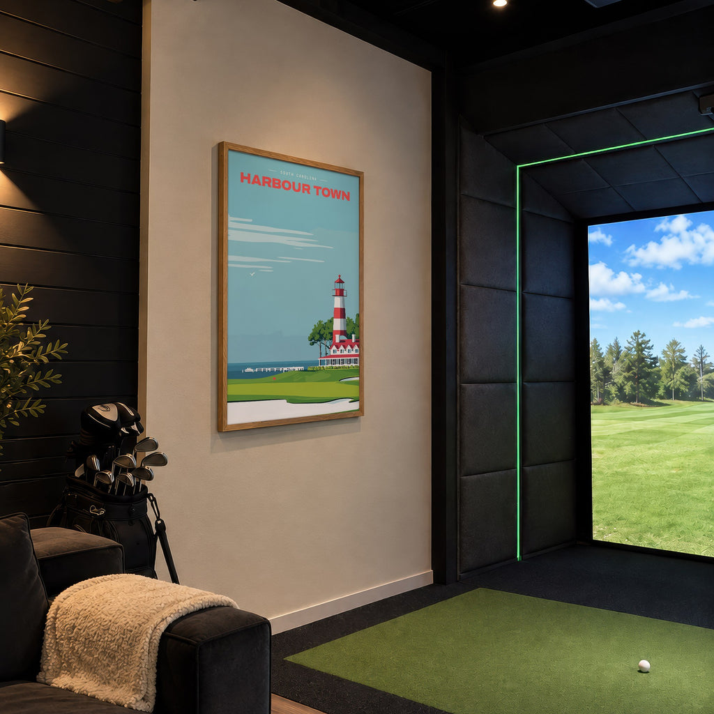 Harbour Town Lighthouse golf print of a striped lighthouse above a marina, framed in a golf simulator room