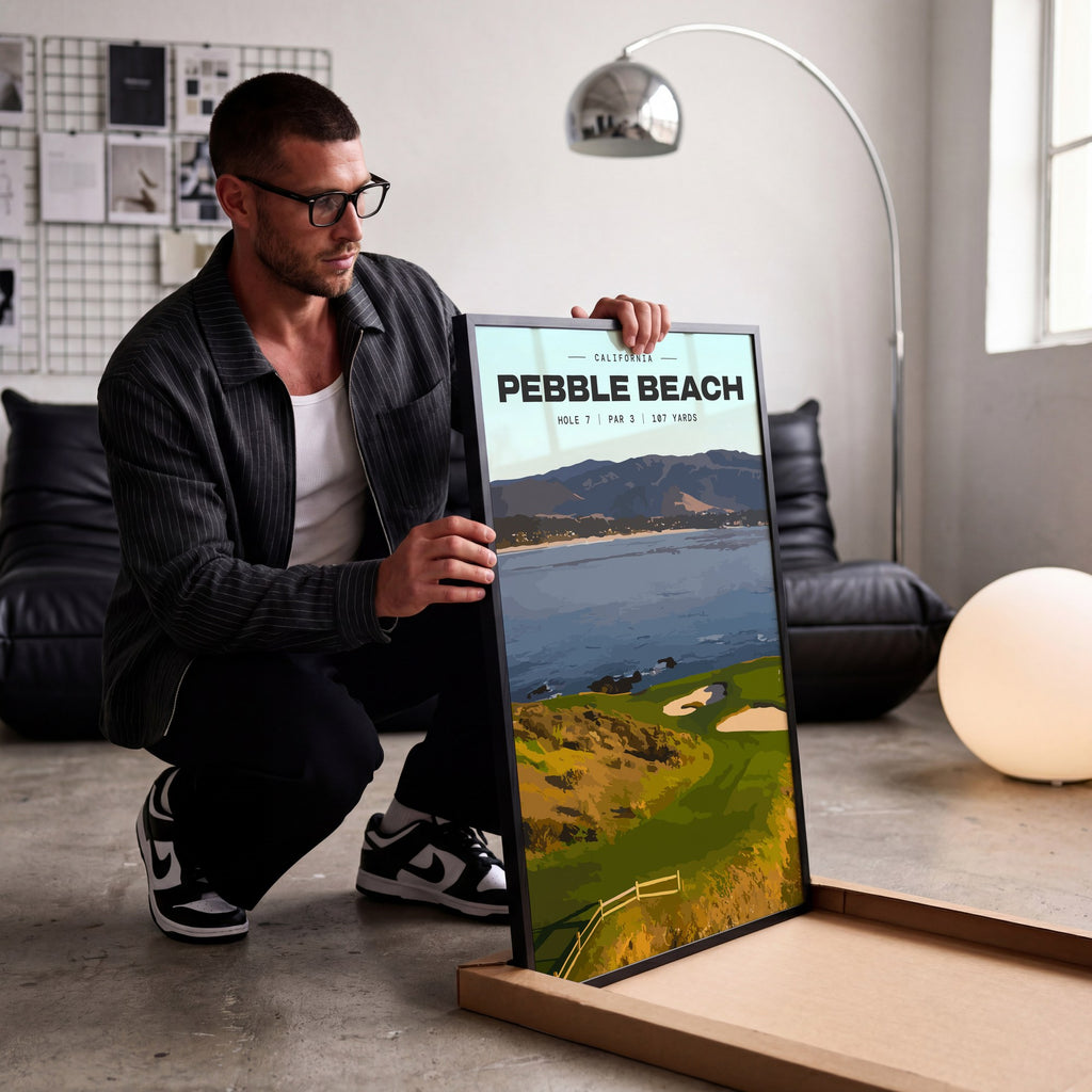 Pebble Beach 7th hole golf print of a small green on a point above the bay, being unboxed in a bright studio