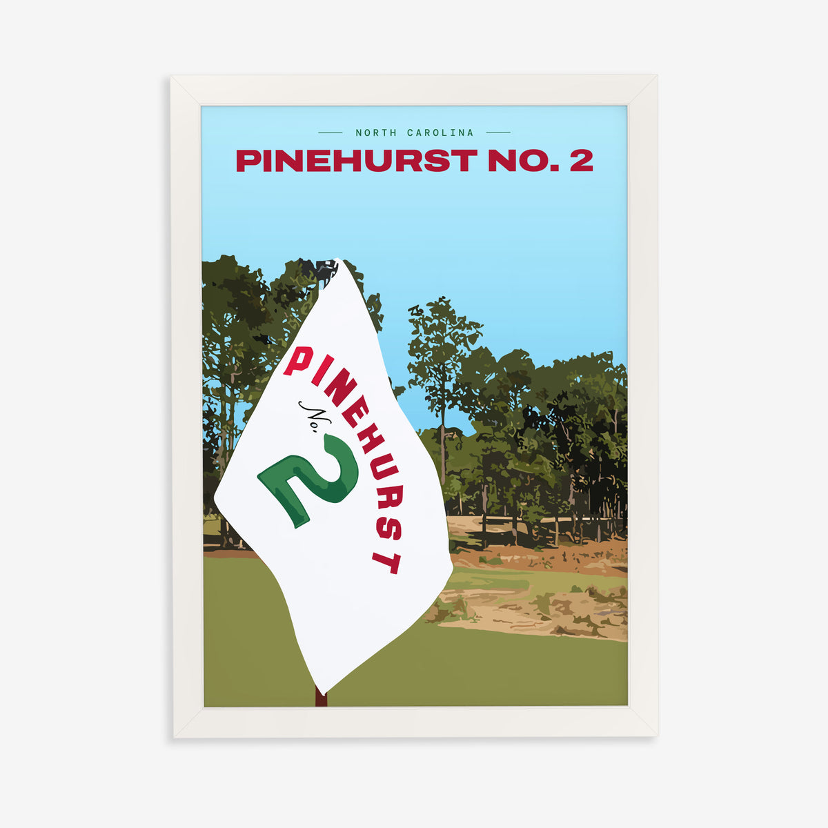 Pinehurst No. 2 golf print of a white pin flag before sandy waste and pines, in a white frame on a plain wall