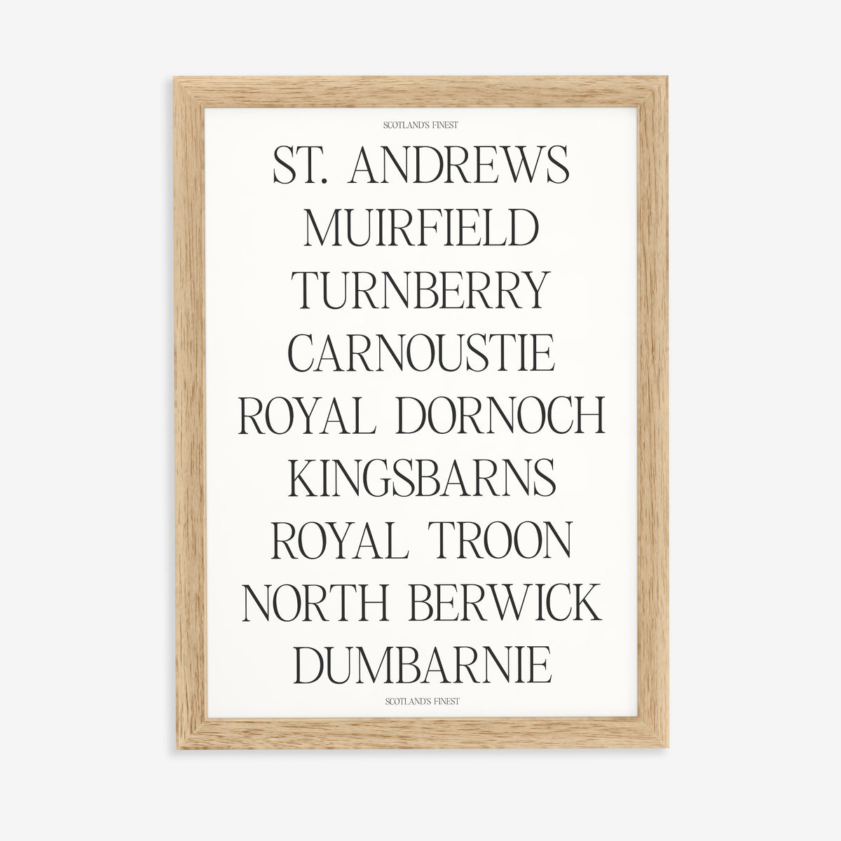 Scotland's Finest golf print of nine Scottish course names in serif type, in a natural wood frame on a plain wall