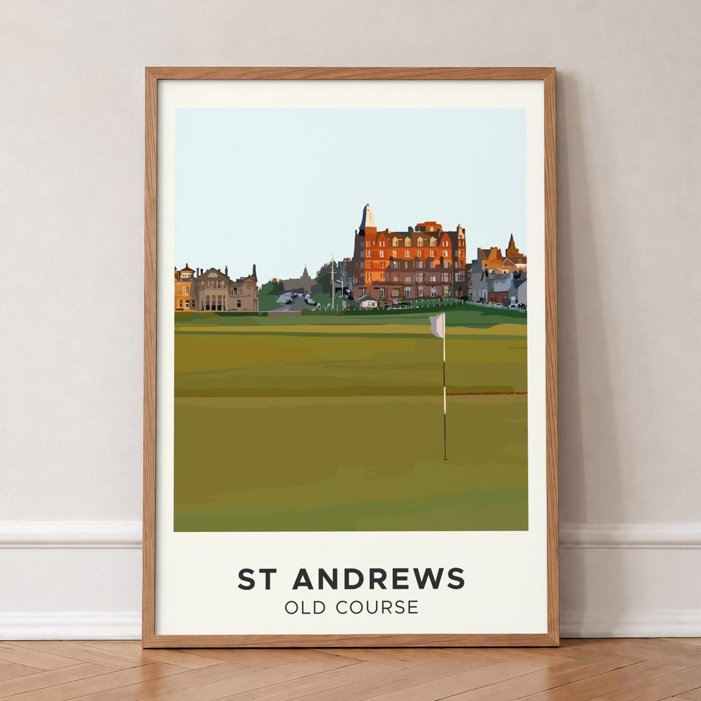 St Andrews Old Course golf print of the 18th green below Hamilton Grand, in an oak frame, leaning against a wall on a herringbone floor