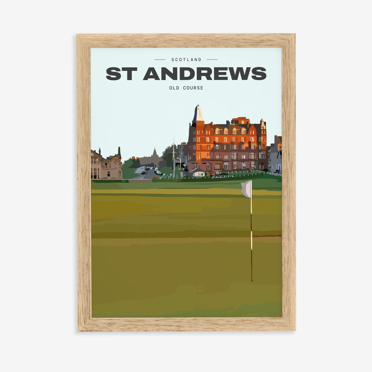 St Andrews Old Course golf print of the 18th green and flag below the town, in a natural wood frame on a plain wall