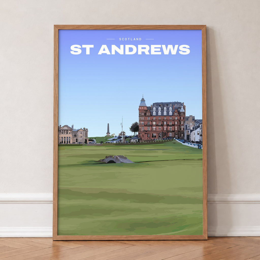 St Andrews Swilcan Bridge golf print of the Swilcan Bridge below the town, in an oak frame, leaning against a wall on a herringbone floor