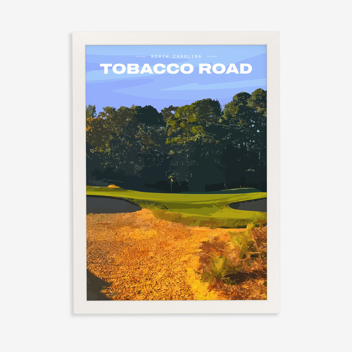 Tobacco Road golf print of a green behind golden sand and pines, in a white frame on a plain wall